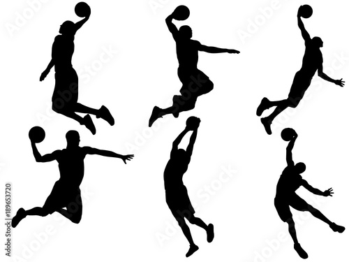 Foto Basketball player dunk silhouette