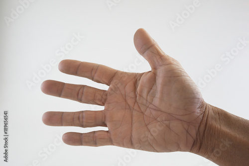 Obraz na plátně Palm wrinkles are clear and the rough hands of aging men on whit