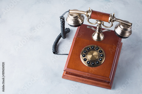 retro phone, wooden, old, telephone on a gray table