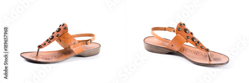 Female brown leather sandal on white background, isolated product, comfortable footwear.