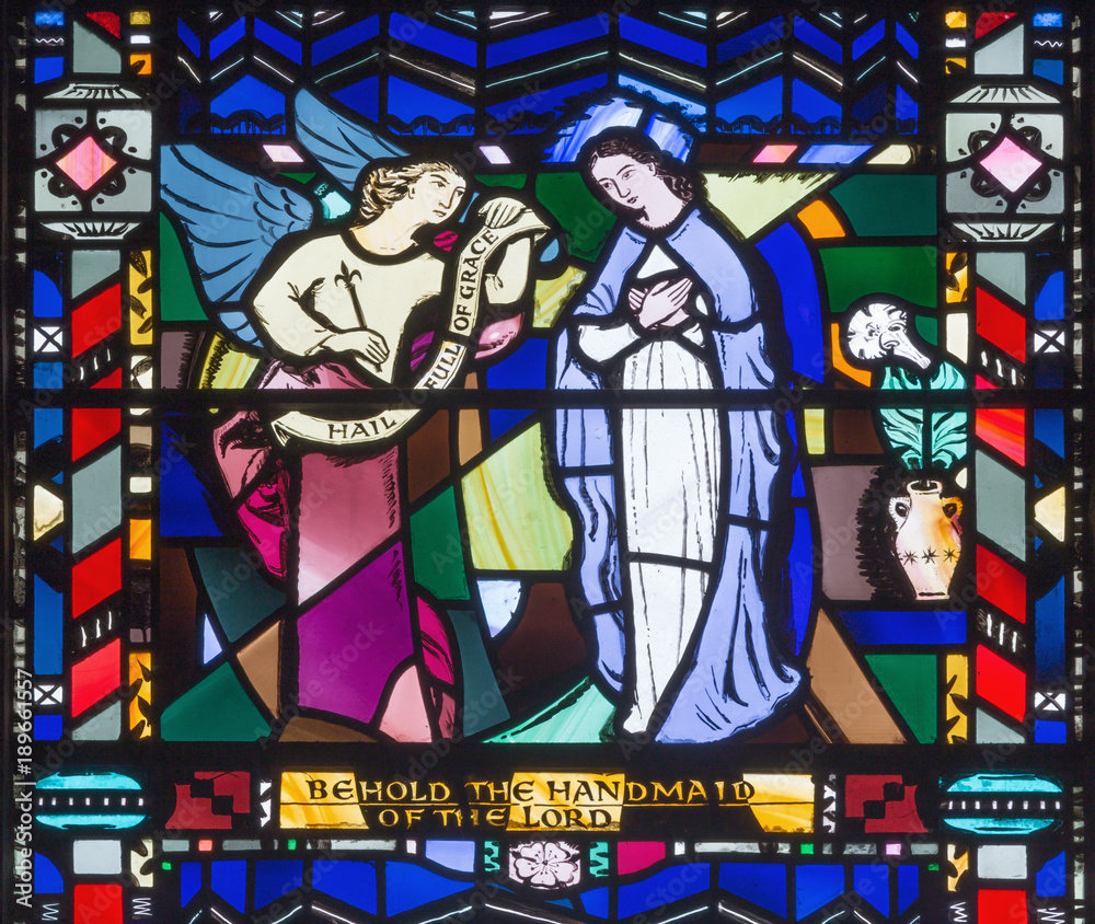 LONDON, GREAT BRITAIN - SEPTEMBER 16, 2017: The Annunciation on the stained glass in church St Etheldreda by Charles Blakeman (1953 - 1953).