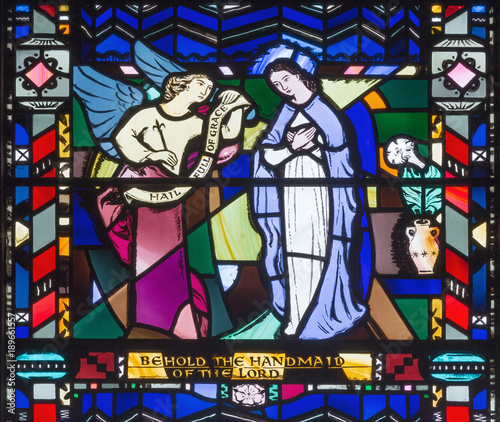 LONDON, GREAT BRITAIN - SEPTEMBER 16, 2017: The Annunciation on the stained glass in church St Etheldreda by Charles Blakeman (1953 - 1953).