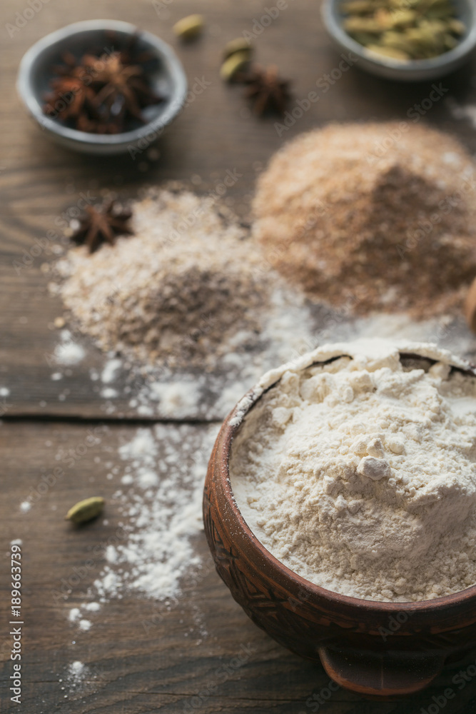 Ingredients for cooking bread or cookies: bran, flour and spices Ingredients for cooking bread or cookies: bran, flour and spices