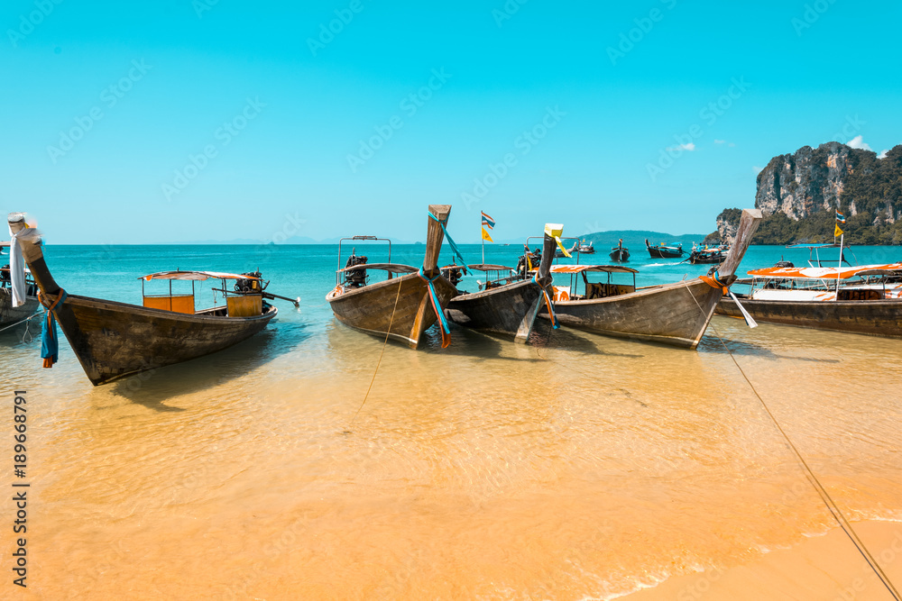 Longtail boats in Railay beach, Krabi peninsula in Thailand