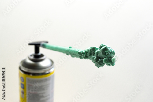 Photography polyurethane expanding foam glue gun.