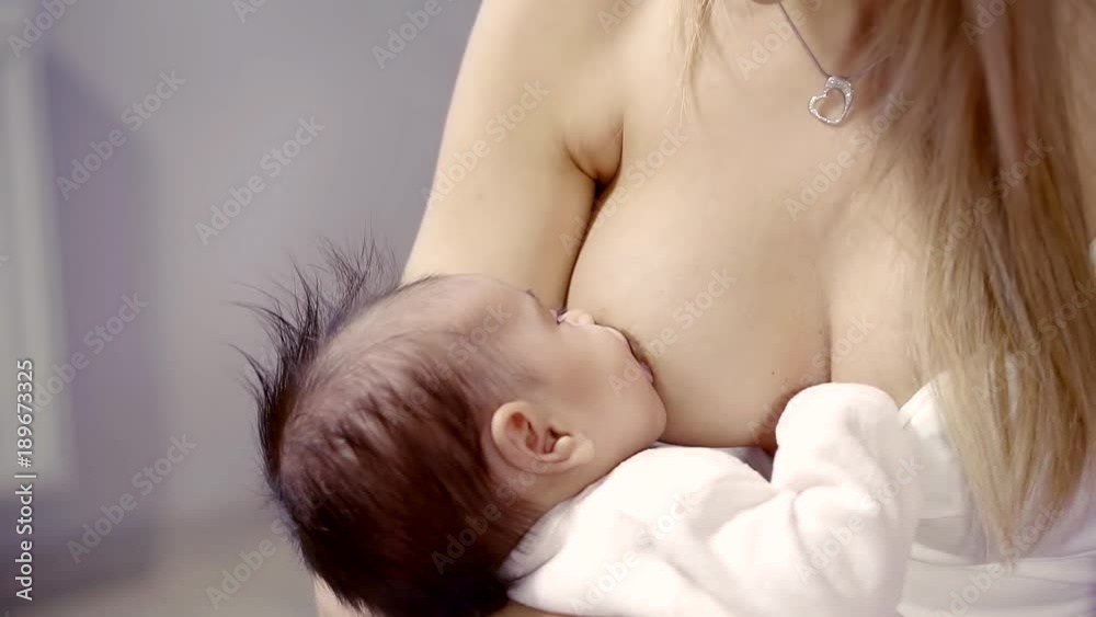 Little girl is sucking milk Stock Video