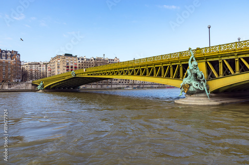 Pont Mirabeau over the Seine - Paris France. The Mirabeau bridge was built between 1895 and 1897. It spans the Seine from the 15th arrondissement on left bank, to the 16th arrondissement. photo