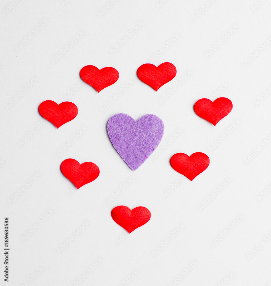 Beautiful paper hearts on white paper background, close-up