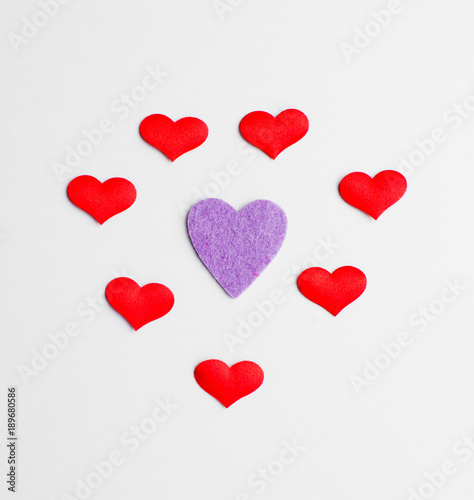 Beautiful paper hearts on white paper background  close-up