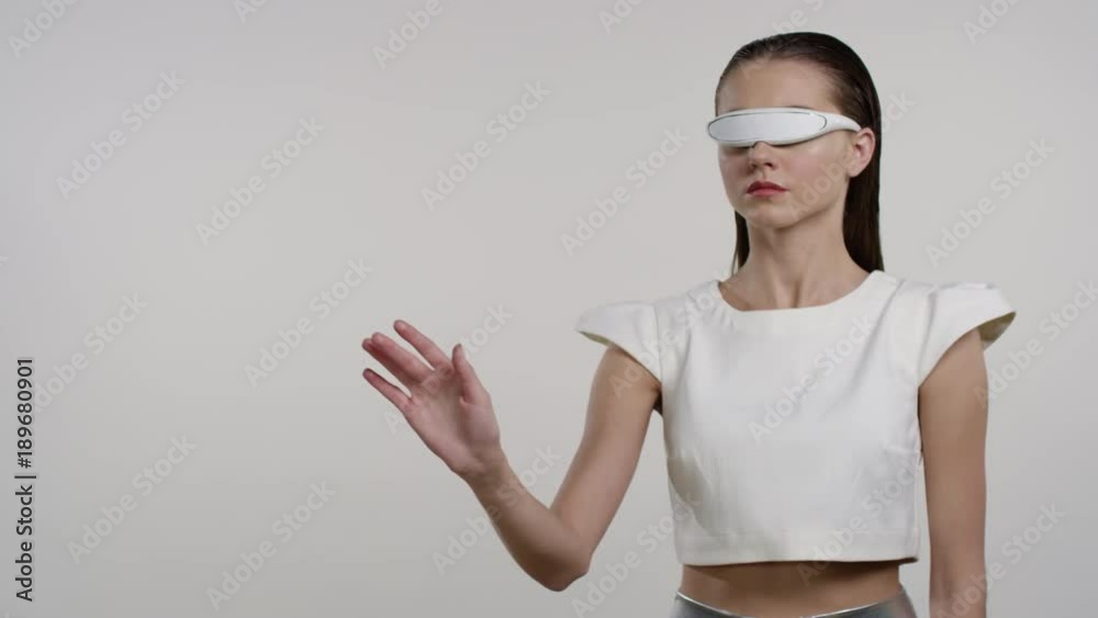 Girl working with virtual screen Girl working with virtual screen