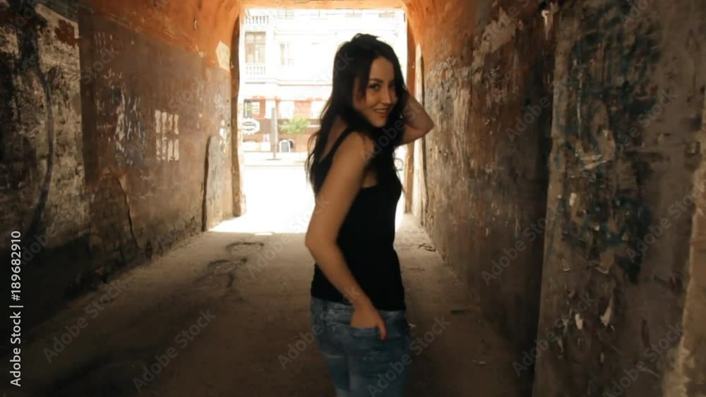 Beautiful girl walking the streets of the old town. Beautiful girl walking the streets of the old town.
