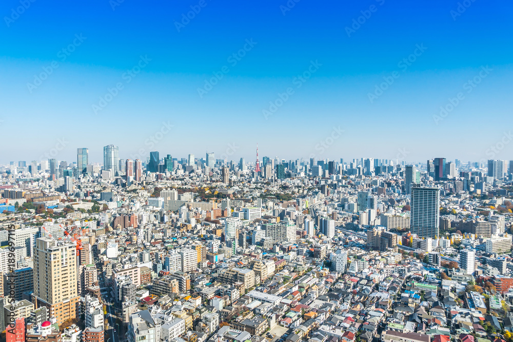 Asia Business concept for real estate and corporate construction - panoramic modern city skyline bird eye aerial view of tokyo tower under blue sky in Tokyo, Japan Asia Business concept for real estate and corporate construction - panoramic modern city skyline bird eye aerial view of tokyo tower under blue sky in Tokyo, Japan