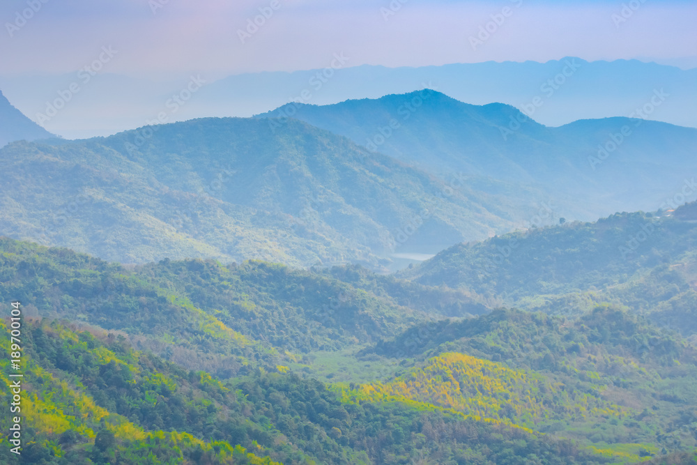 Hills and mountains are alternating layers. Landscape view