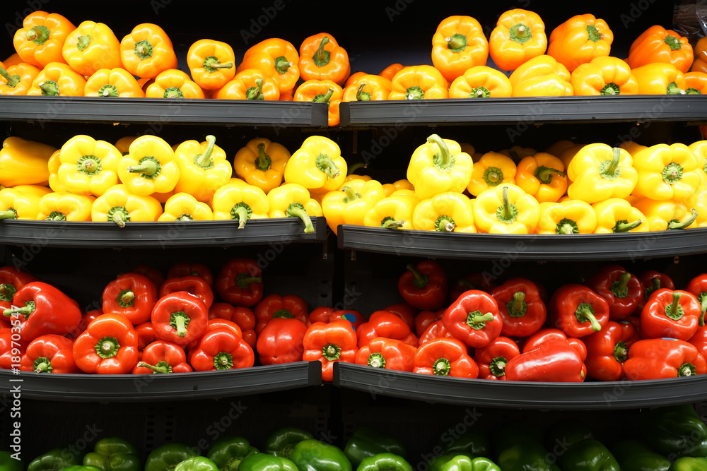 Close up on fresh colorful bell pepper sale in store