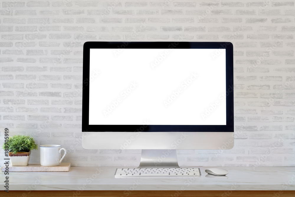 Mockup desktop blank screen computer and coffee mug on table. Mockup desktop blank screen computer and coffee mug on table.