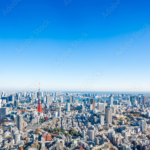 Asia Business concept for real estate and corporate construction - panoramic modern city skyline bird eye aerial view of tokyo tower and odaiba under blue sky in Roppongi Hill, Tokyo, Japan