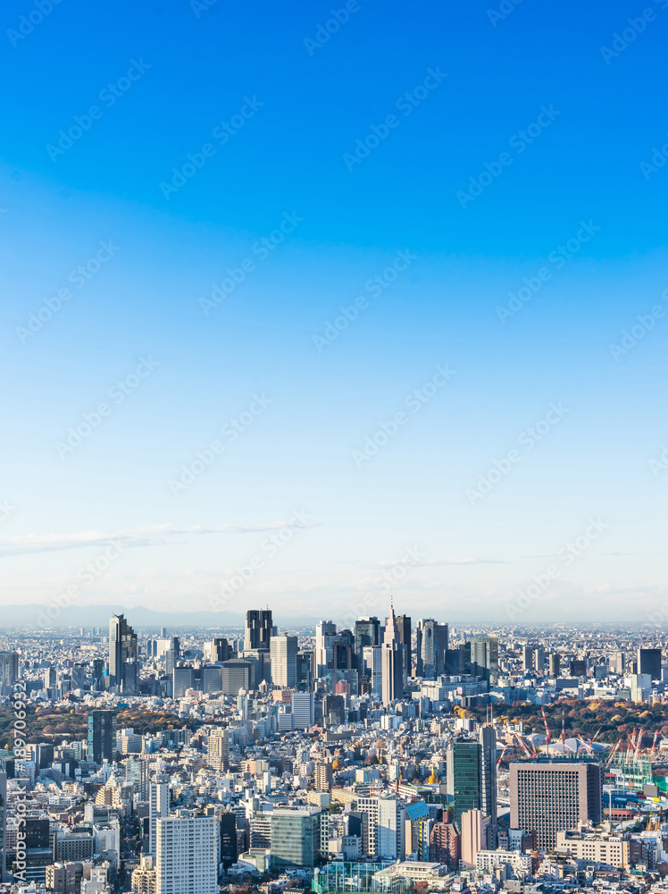 Asia Business concept for real estate and corporate construction - panoramic modern city skyline bird eye aerial view of Shinjuku under blue sky in Roppongi Hill, Tokyo, Japan