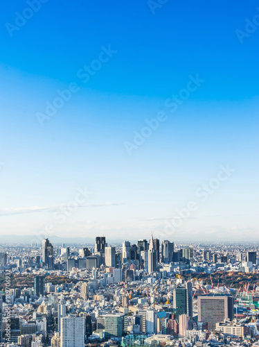 Asia Business concept for real estate and corporate construction - panoramic modern city skyline bird eye aerial view of Shinjuku under blue sky in Roppongi Hill, Tokyo, Japan