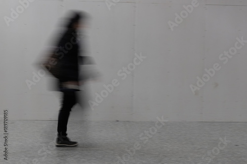 blurry person walking