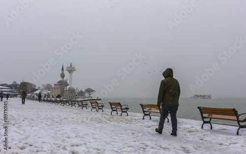 Snowy day in Istanbul, Turkey. Peoples walking on snow. .