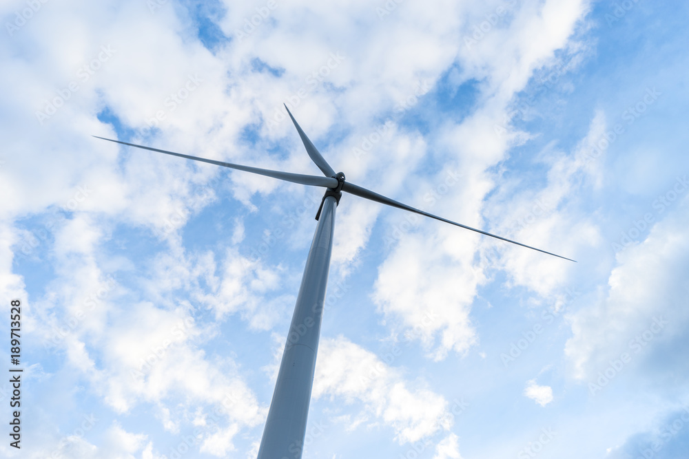Wind Turbines in Wind Farm with Cloudy Blue Sky at Khao Kho District of Phetchabun Province, Thailand. Wind Turbines in Wind Farm with Cloudy Blue Sky at Khao Kho District of Phetchabun Province, Thailand.