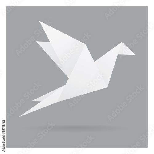 white bird paper craft flying in frame art isolated on gray black background