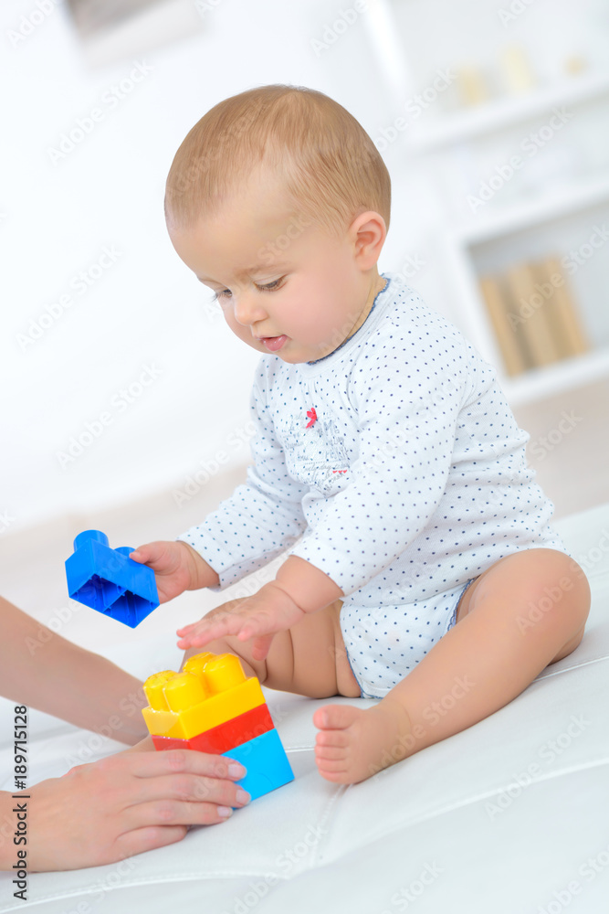 happy baby playing in the constructor happy baby playing in the constructor
