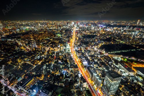 Asia Business concept for real estate & corporate construction - panoramic modern city skyline view of Shibuya & Tokyo Metropolitan Expressway with neon night in Roppongi Hill, Tokyo, Japan © voyata