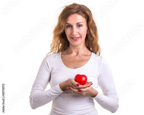 Love heart  protect and healthcare concept   Caucasian woman holding red heart on her chest and heart position isolated on white