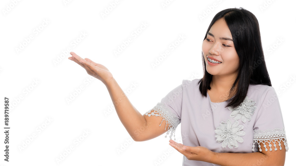 Beautiful asian business woman smiling and pointed the finger to left side portrait studio on white background Beautiful asian business woman smiling and pointed the finger to left side portrait studio on white background