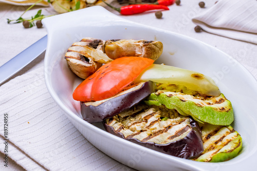 Grilled vegetables on a white plate