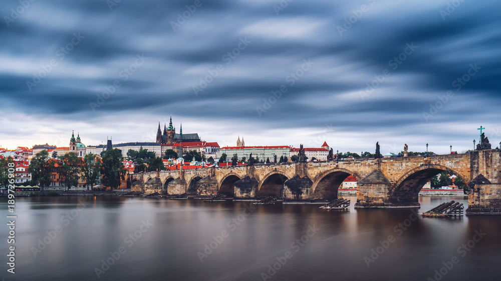 Obraz premium Famous iconic image of Charles bridge, Prague, Czech Republic. Concept of world travel, sightseeing and tourism.