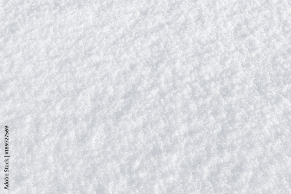 Fototapeta premium Background of fresh snow texture. Snow winter and christmas concept