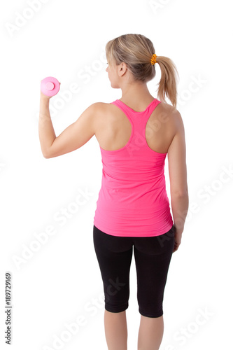 woman exercising with dumbbell
