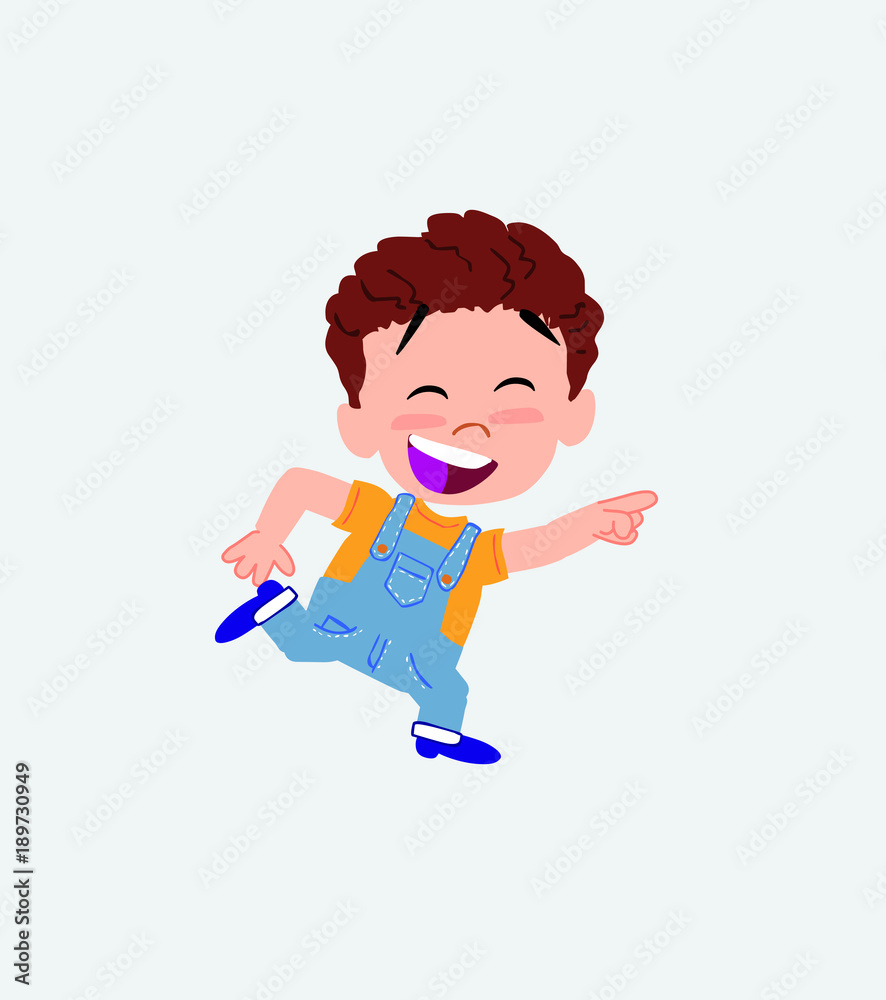 White boy in jeans running smiling. White boy in jeans running smiling.