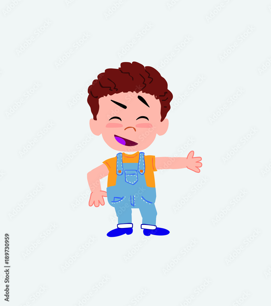 White boy in jeans showing something in an optimistic and positive attitude. White boy in jeans showing something in an optimistic and positive attitude.