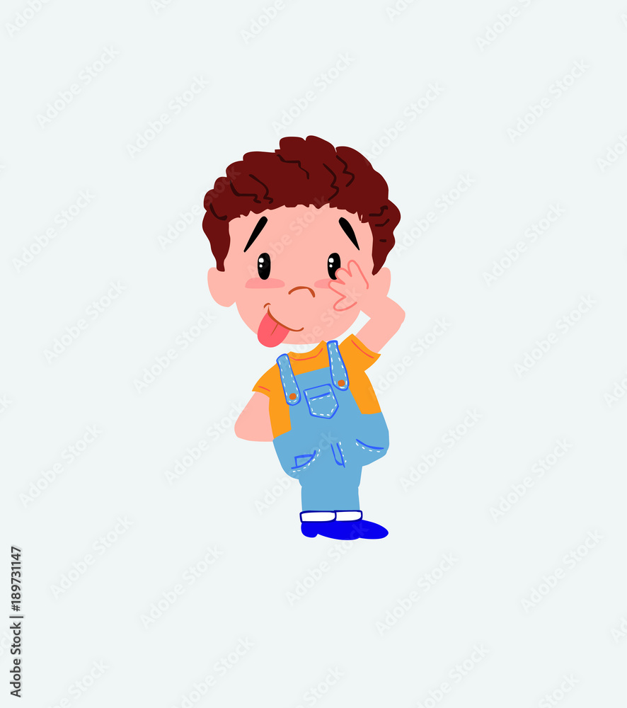 White boy in jeans sticks out his tongue in gesture of funny shyness. White boy in jeans sticks out his tongue in gesture of funny shyness.