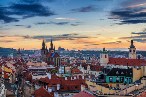 Aerial view over Church of Our Lady before Tyn, Old Town and Prague Castle at sunset in Prague, Czech Republic