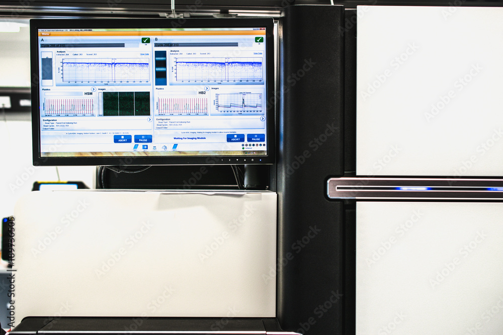 Computer and Genome DNA Sequencer. Technology or laboratory abstract background for Next Generation Sequencing.