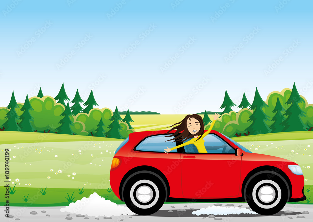 Cheerful woman in a red car on a road in the field.