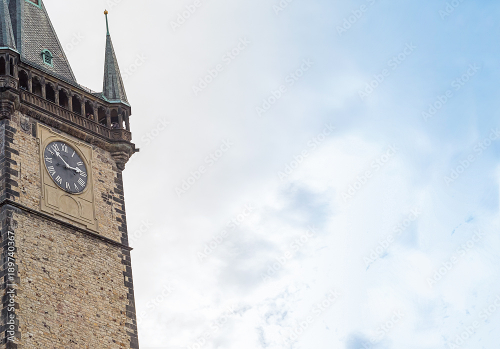 Obraz premium sky tower gothic clock, historical building pointed roof close-up. Prague Czech Republic 2017