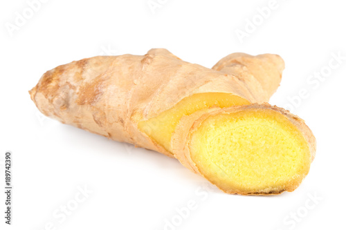 Ginger root with slices isolated on white