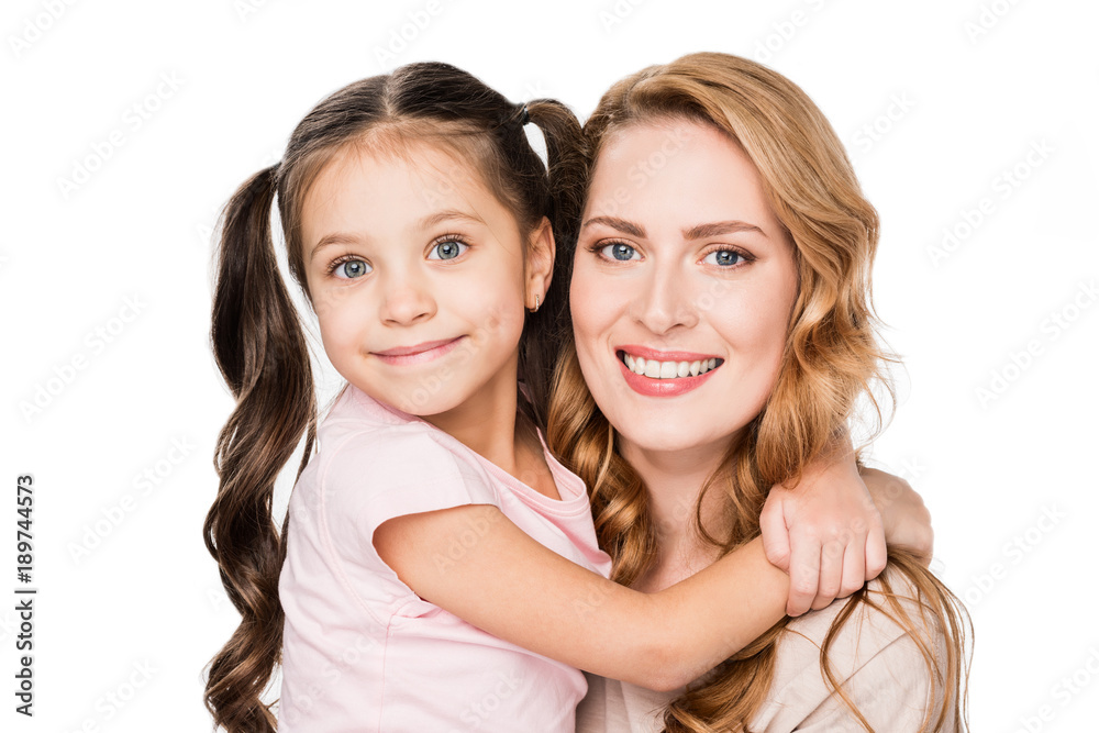portrait of smiling daughter hugging mother isolated on white portrait of smiling daughter hugging mother isolated on white