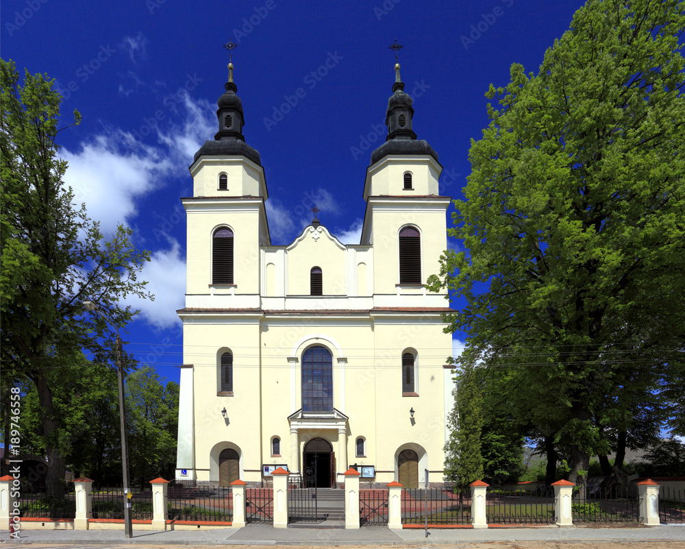 Jedwabne, Masuria / Poland - 2009/05/05: historic roman-catholic parish church of St. Jacob Apostel in town of Jedwabne