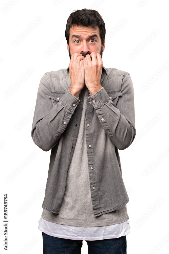 Frightened handsome man with beard on white background Frightened handsome man with beard on white background