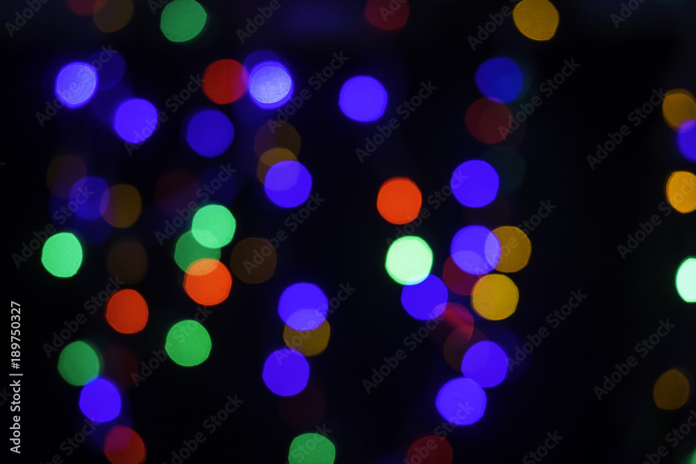 colorful bokeh growing in the dark