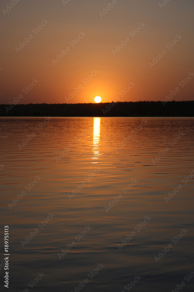 sunset on the river niger