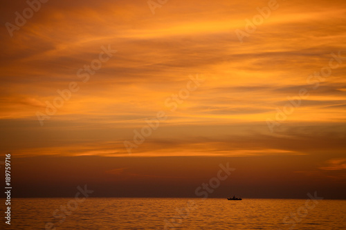 Amazing sunset over the sea © jahmaica