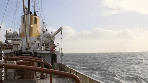 passing a green lateral buoy in a shipping channell photo