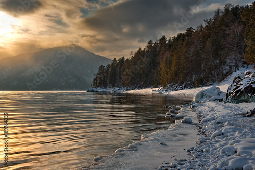 Fototapeta Naklejka Na Ścianę i Meble -  Russia. mountain Altai. Sunset on lake Teletskoye.